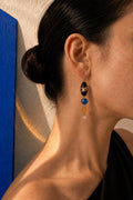Model wearing Atelier N°8 Midnight Mosaic handcrafted glass earrings