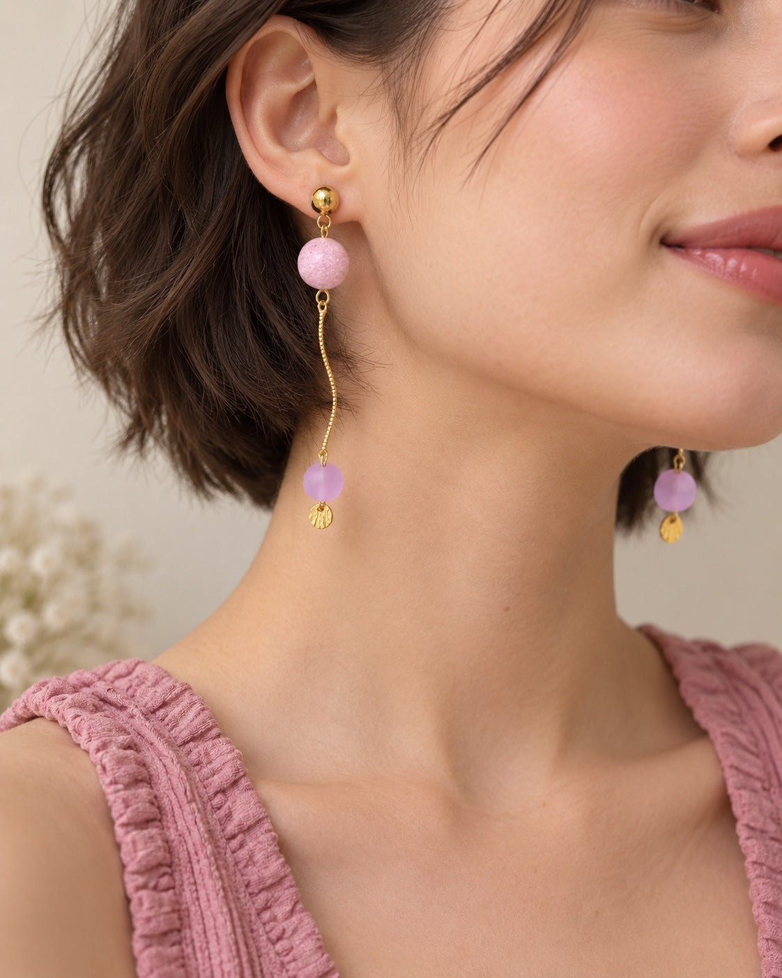 Lilac drop earrings worn by model
