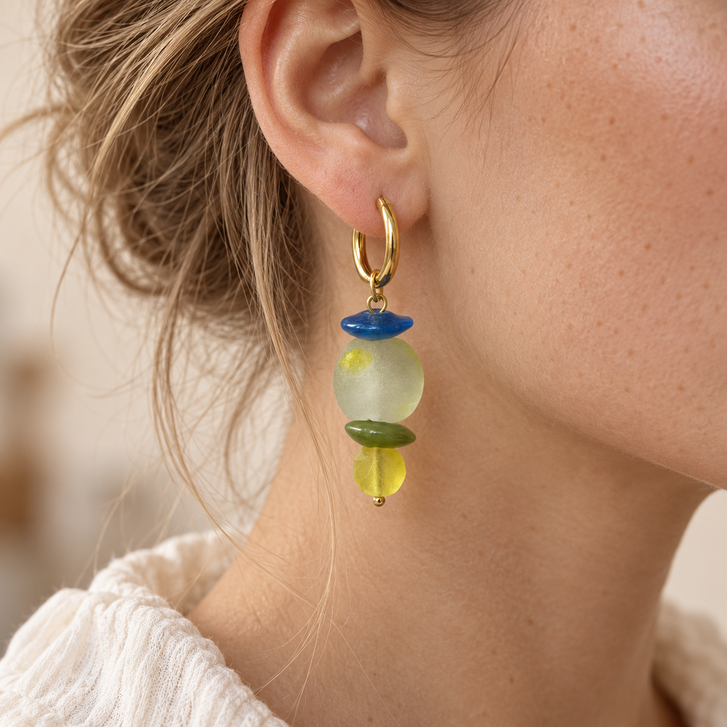 Model wearing LULA Citrus Tide glass earrings