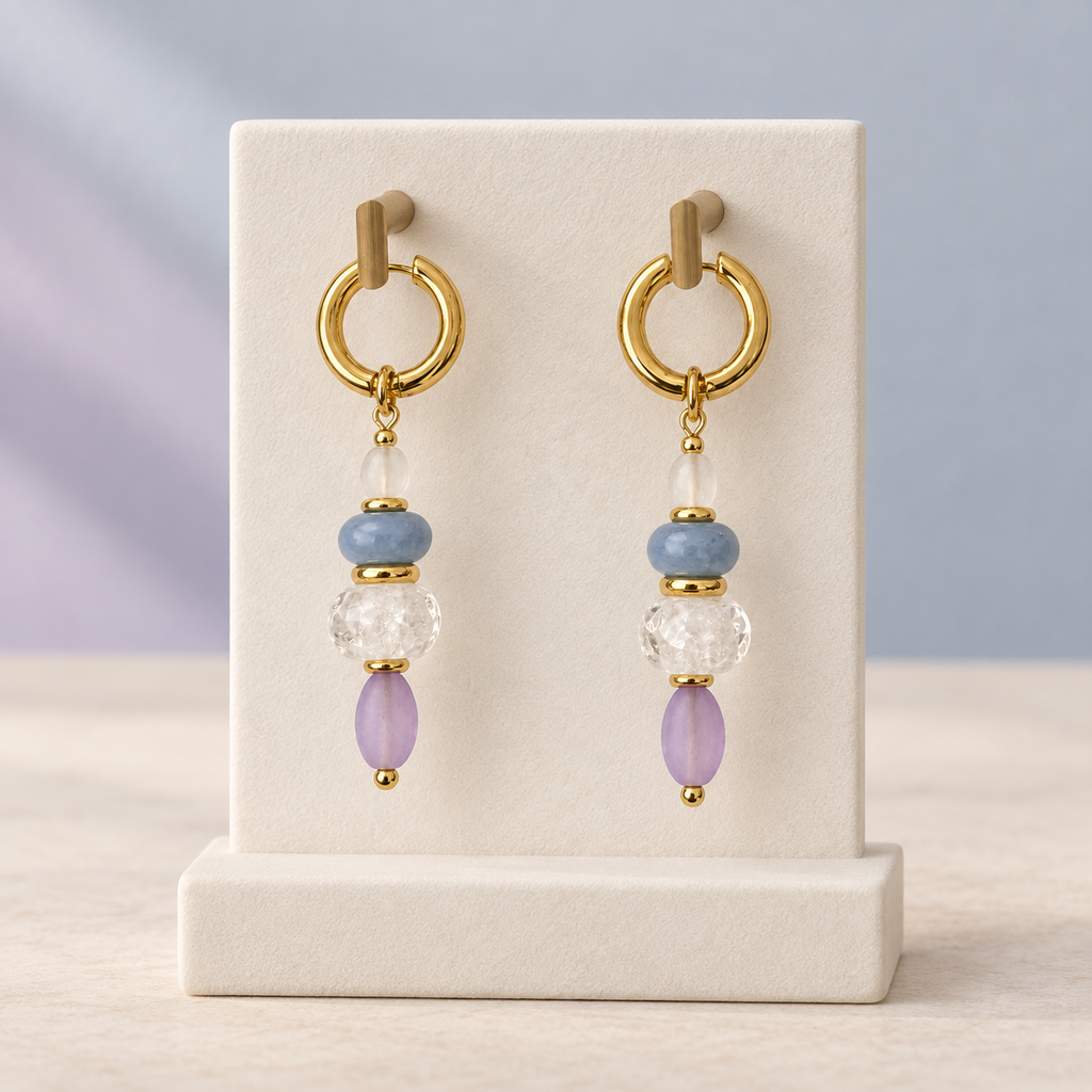 LULA Lilac Sky earrings on a minimal jewellery display
