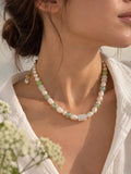 LULA Verde freshwater pearl necklace worn on model